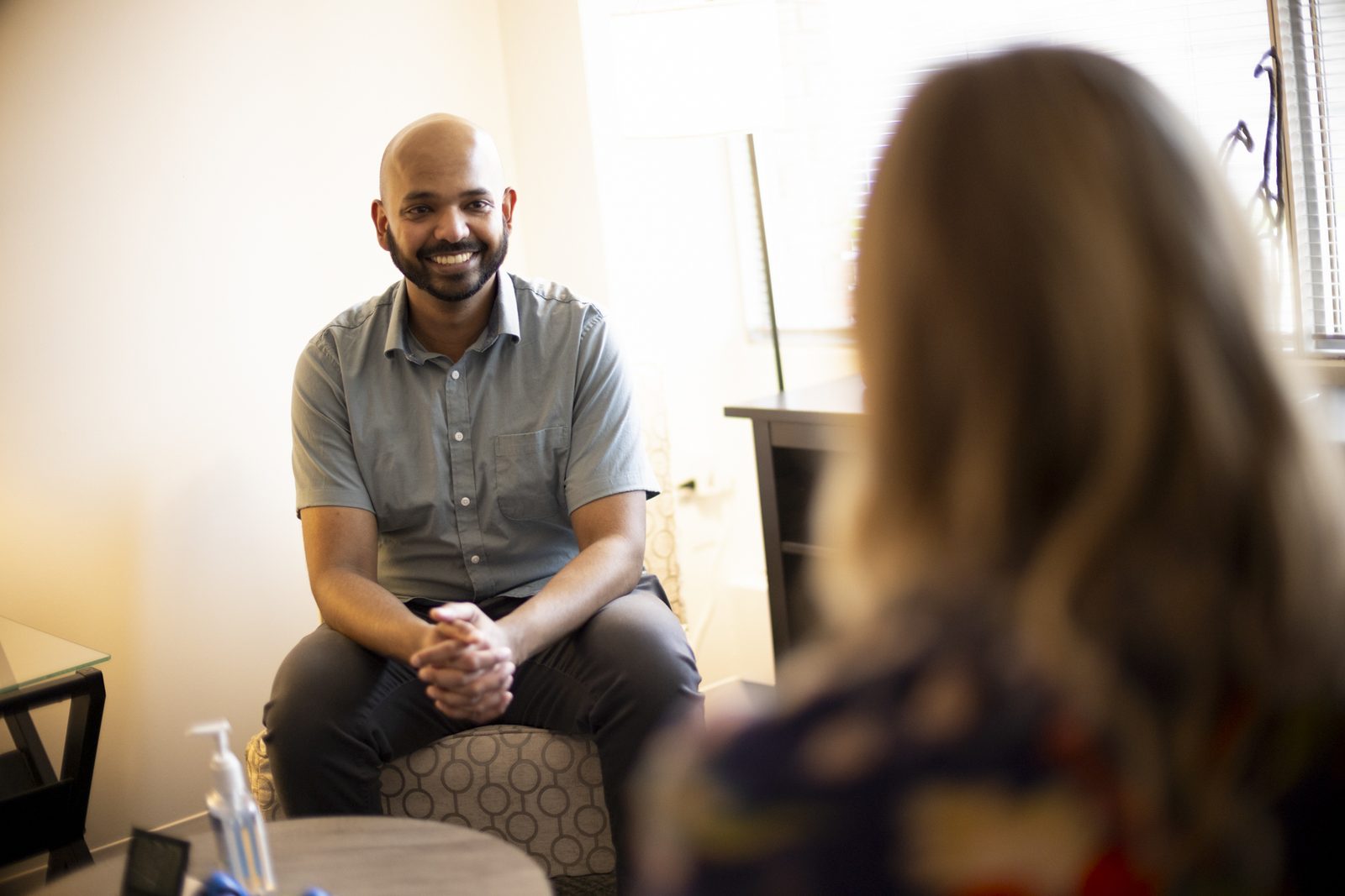 A Your Counselling clinician welcoming a client